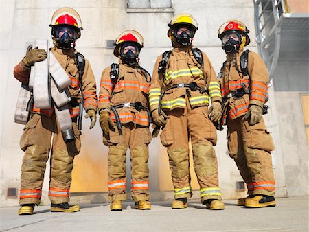 female firefighter portrait - Firefighters Outside of Smoke-filled Building Stock Photo - Premium Royalty-Free, Code: 600-01172204