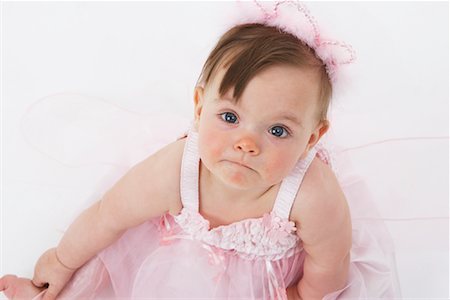 picture of cute dark haired baby girls - Portrait of Baby in Costume Stock Photo - Premium Royalty-Free, Code: 600-01172726