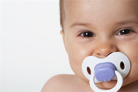 simsearch:600-01172745,k - Portrait of Baby with Pacifier Foto de stock - Royalty Free Premium, Número: 600-01172734