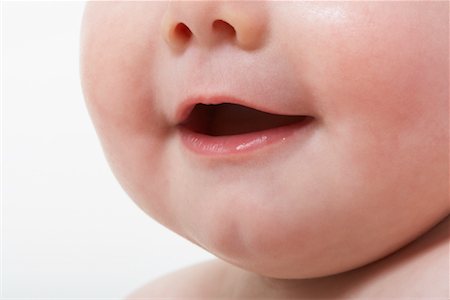 simsearch:700-02686511,k - Close-up of Baby's Mouth Fotografie stock - Premium Royalty-Free, Codice: 600-01172759