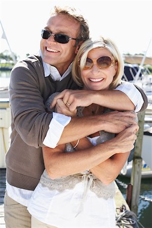 Couple on Dock at Marina Stock Photo - Premium Royalty-Free, Code: 600-01173395