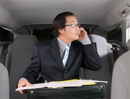 simsearch:614-02003461,k - Businessman Working in Car Stock Photo - Premium Royalty-Free, Code: 600-01173834