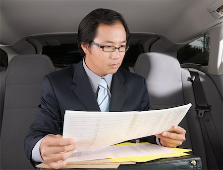 simsearch:600-01173901,k - Businessman Working in Car Stock Photo - Premium Royalty-Free, Code: 600-01173832
