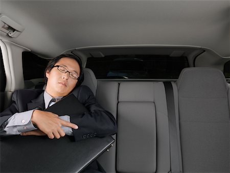simsearch:600-01173901,k - Businessman Sleeping in Car Stock Photo - Premium Royalty-Free, Code: 600-01173842