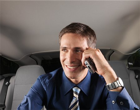 Businessman Using Cellular Telephone Stock Photo - Premium Royalty-Free, Code: 600-01173898