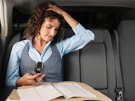 Businesswoman in Car Stock Photo - Premium Royalty-Free, Code: 600-01173934