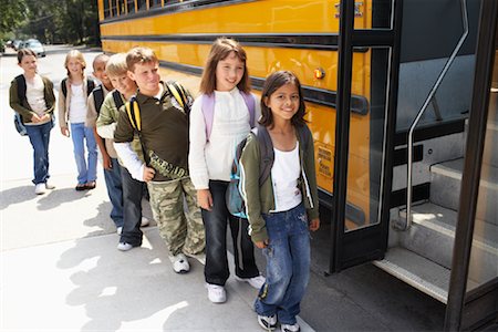 person standing to bus - Children by School Bus Stock Photo - Premium Royalty-Free, Code: 600-01184649