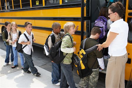person standing to bus - Children by School Bus Stock Photo - Premium Royalty-Free, Code: 600-01184651