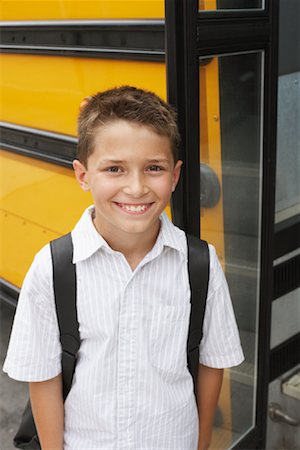Boy by School Bus Stock Photo - Premium Royalty-Free, Code: 600-01184671