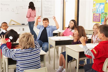 photo of class with misbehaving kids - Students and Teacher in Classroom Foto de stock - Sin royalties Premium, Código: 600-01184703