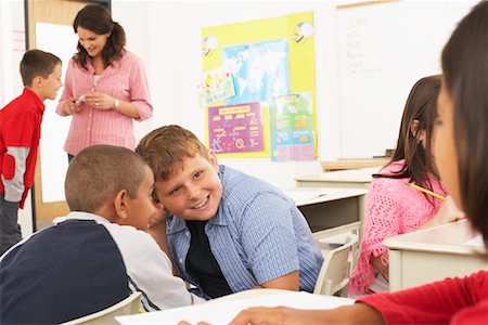 pictures of a little boy in school in trouble - Students and Teacher in Classroom Stock Photo - Premium Royalty-Free, Code: 600-01184717