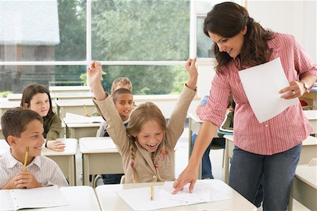 exam success - Students and Teacher in Classroom Stock Photo - Premium Royalty-Free, Code: 600-01184725