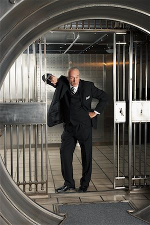 strongroom bank security - Man in Bank Vault Stock Photo - Premium Royalty-Free, Code: 600-01185368