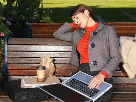 simsearch:700-00350275,k - Woman Falling Asleep on Park Bench While Using Laptop Computer Stock Photo - Premium Royalty-Free, Code: 600-01194864