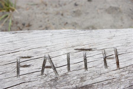 faith (not religious) - Faith Carved into Log Stock Photo - Premium Royalty-Free, Code: 600-01195089