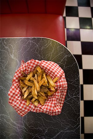 french fry top view nobody - Basket of French Fries at Diner Stock Photo - Premium Royalty-Free, Code: 600-01195470