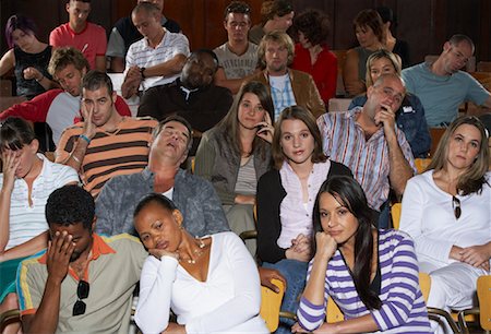 Bored People in Auditorium Seats Foto de stock - Sin royalties Premium, Código: 600-01195616