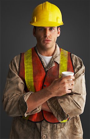 engineer standing with arms crossed - Portrait of Construction Worker Stock Photo - Premium Royalty-Free, Code: 600-01195815