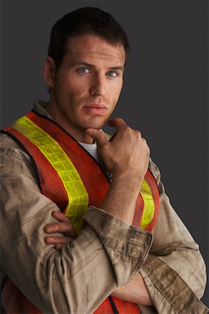 engineer standing with arms crossed - Portrait of Construction Worker Stock Photo - Premium Royalty-Free, Code: 600-01195819