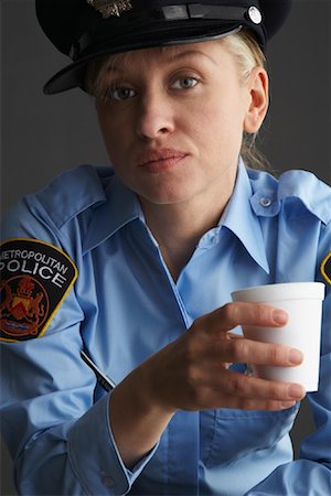 simsearch:632-08227905,k - Portrait of Police Officer Stock Photo - Premium Royalty-Free, Code: 600-01195825