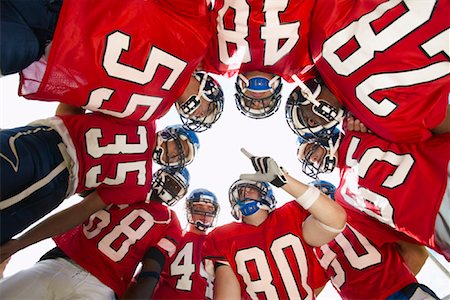 Football Players in Huddle Foto de stock - Sin royalties Premium, Código: 600-01196519