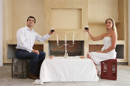 simsearch:600-01275158,k - Couple Dining in Empty House Stock Photo - Premium Royalty-Free, Code: 600-01196672