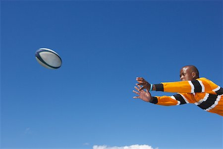 Man Diving for Ball Foto de stock - Sin royalties Premium, Código: 600-01196764