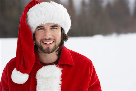 Man Wearing Santa Suit, Meadow Park, Whistler, British Columbia, Canada Stock Photo - Premium Royalty-Free, Code: 600-01196835