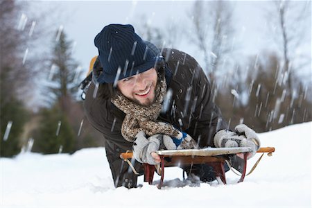 simsearch:700-01275976,k - Man on Sled Stock Photo - Premium Royalty-Free, Code: 600-01196884