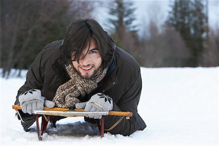 simsearch:600-01248055,k - Portrait of Man on Sled Stock Photo - Premium Royalty-Free, Code: 600-01196883