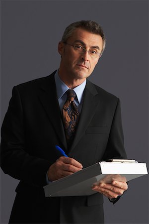 simsearch:700-00782376,k - Portrait of Businessman with Clipboard Stock Photo - Premium Royalty-Free, Code: 600-01199040