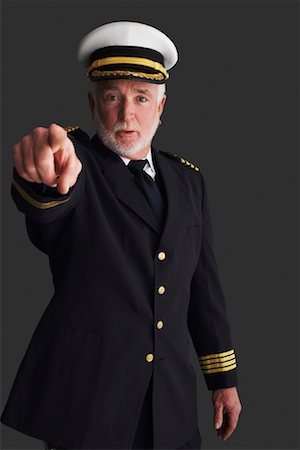 foreshortening - Sea Captain Pointing Stock Photo - Premium Royalty-Free, Code: 600-01199076