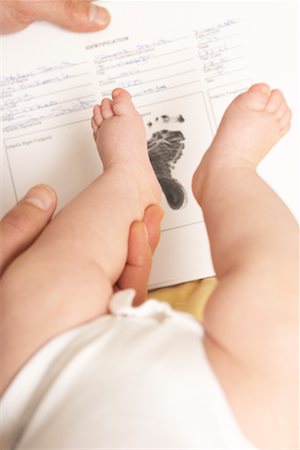 reparto maternità - Taking Baby's Footprints Fotografie stock - Premium Royalty-Free, Codice: 600-01199676