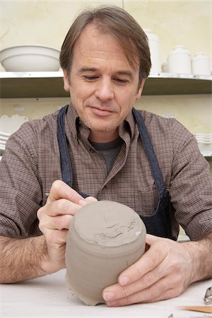 pottery - Portrait of Man in Pottery Studio Stock Photo - Premium Royalty-Free, Code: 600-01200369