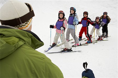 simsearch:600-01224161,k - Man Teaching Students at Ski School, Whistler, British Columbia, Canada Fotografie stock - Premium Royalty-Free, Codice: 600-01224134