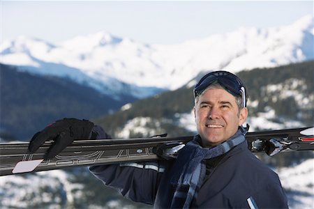 simsearch:600-01235160,k - Portrait of Man with Skis Stock Photo - Premium Royalty-Free, Code: 600-01235155