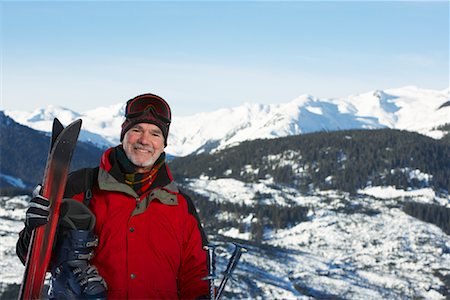 simsearch:600-01235156,k - Portrait of Man with Skis Stock Photo - Premium Royalty-Free, Code: 600-01235159