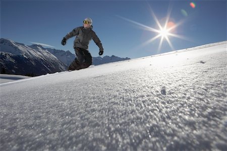 standing on snowboarding - Man Snowboarding Foto de stock - Sin royalties Premium, Código: 600-01235272