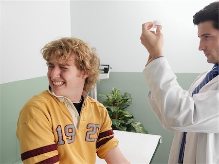 physical examination boy - Boy Getting Injection Stock Photo - Premium Royalty-Free, Code: 600-01236187