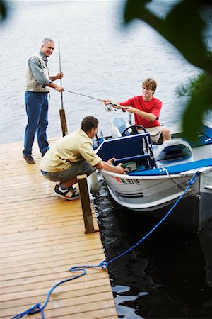 Man and Teenagers Fishing, Belgrade Lakes, Maine, USA Foto de stock - Sin royalties Premium, Código: 600-01236626