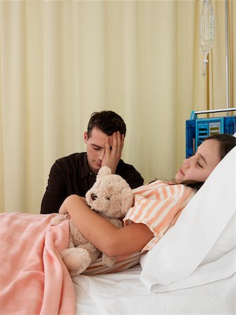 father sick child - Man and Girl in Hospital Room Stock Photo - Premium Royalty-Free, Code: 600-01248212