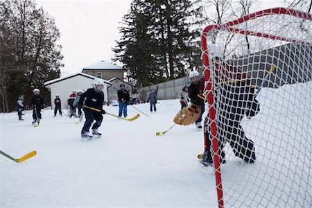 pic of hockey rink with people skating - Children Playing Hockey Stock Photo - Premium Royalty-Free, Code: 600-01248852