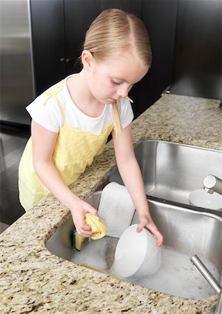 Girl Washing Dishes Stock Photo - Premium Royalty-Free, Code: 600-01260360