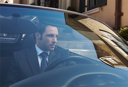 reflection on windshield - Businessman in Convertible Stock Photo - Premium Royalty-Free, Code: 600-01275483