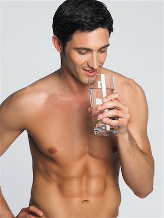 simsearch:600-00845951,k - Man Drinking Water Foto de stock - Sin royalties Premium, Código: 600-01275618