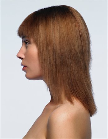 profile woman head and shoulders one person studio shot side view looking away - Portrait of Woman Stock Photo - Premium Royalty-Free, Code: 600-01275668
