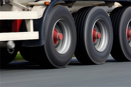 semi truck on highway image - Truck Wheels in Motion Stock Photo - Premium Royalty-Free, Code: 600-01276058
