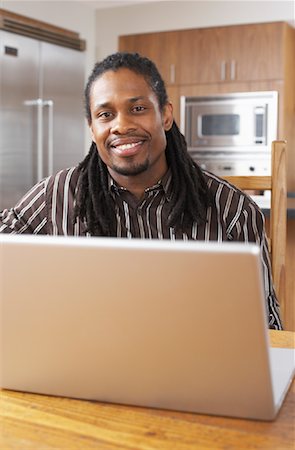 Man with Laptop Computer Stock Photo - Premium Royalty-Free, Code: 600-01276377
