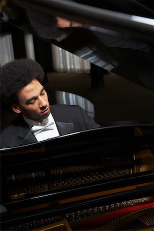 playing instruments in a auditorium - Portrait of Pianist Stock Photo - Premium Royalty-Free, Code: 600-01295563