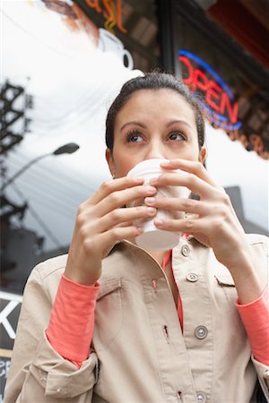 simsearch:600-03406521,k - Woman Drinking Coffee Stock Photo - Premium Royalty-Free, Code: 600-01295956